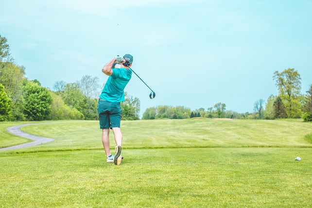 A golfer after hitting a drive