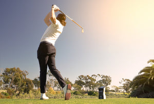 Golfer Using GCQuad Launch Monitor on greens