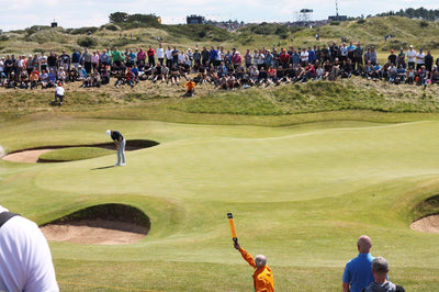 people watching golf tournament