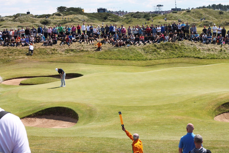 people watching golf tournament