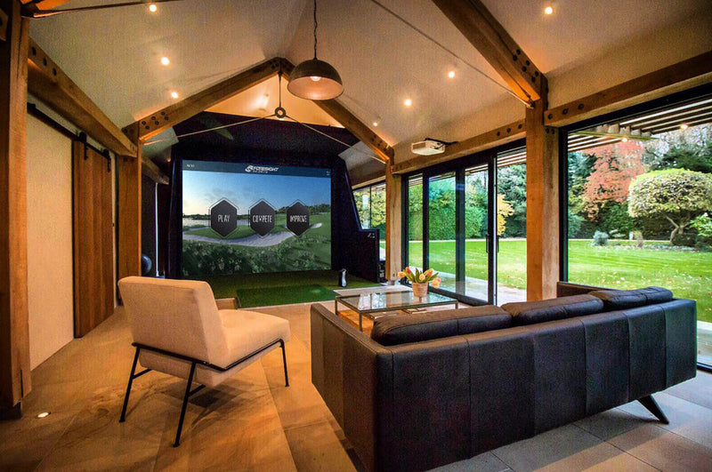 golf stimulator in living room with a green view outside