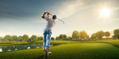 Male golf player on professional golf course.
