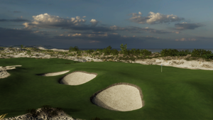 multiple sand traps near a golf hole