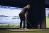 Professional Golfer using golf sim
