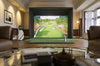 Small golf simulator set up in a living room